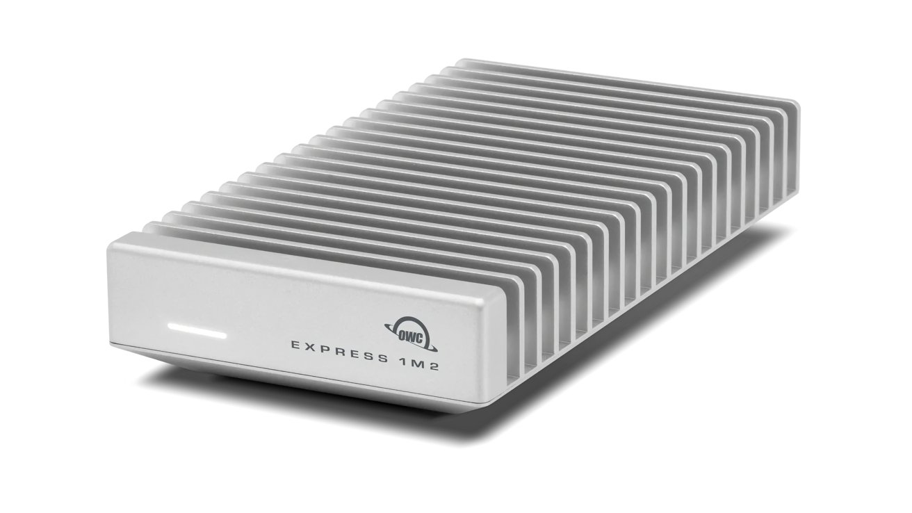 Silver rectangular external hard drive with horizontal cooling fins and a small LED light on the front panel.