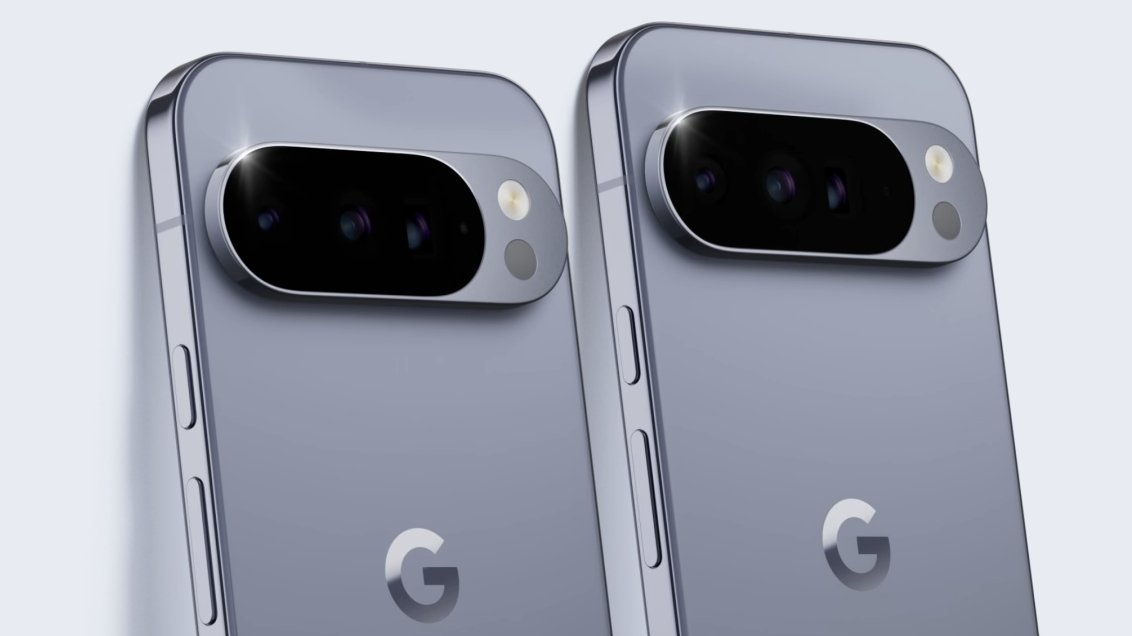 Two gray smartphones with dual rear cameras and a flash, featuring a sleek design and a 'G' logo on the back.