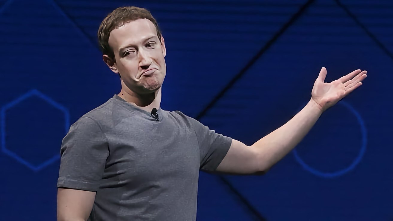 Person in a gray shirt with a raised hand and expressive face against a blue background with a geometric pattern.
