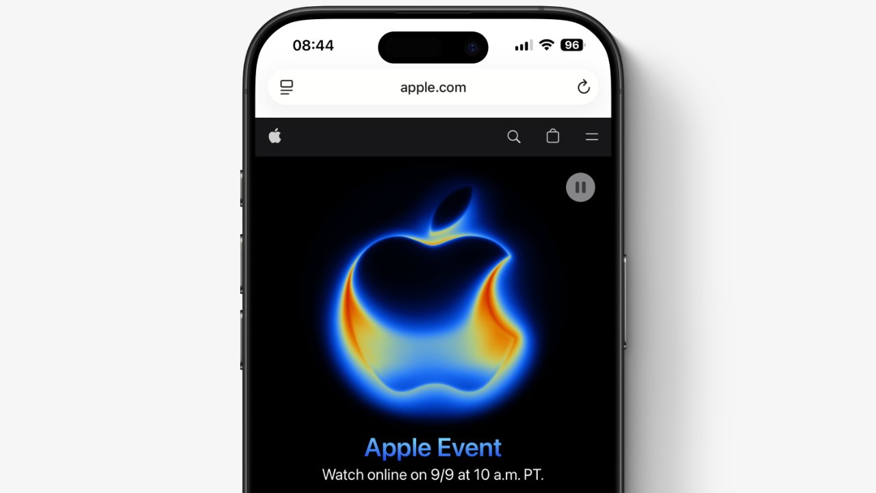 Smartphone displaying a vibrant, glowing apple logo with event details, set against a dark background.