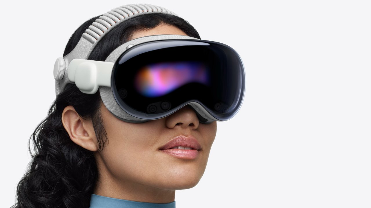 A person wearing a sleek, futuristic virtual reality headset with a reflective, dark visor displaying colorful lights.