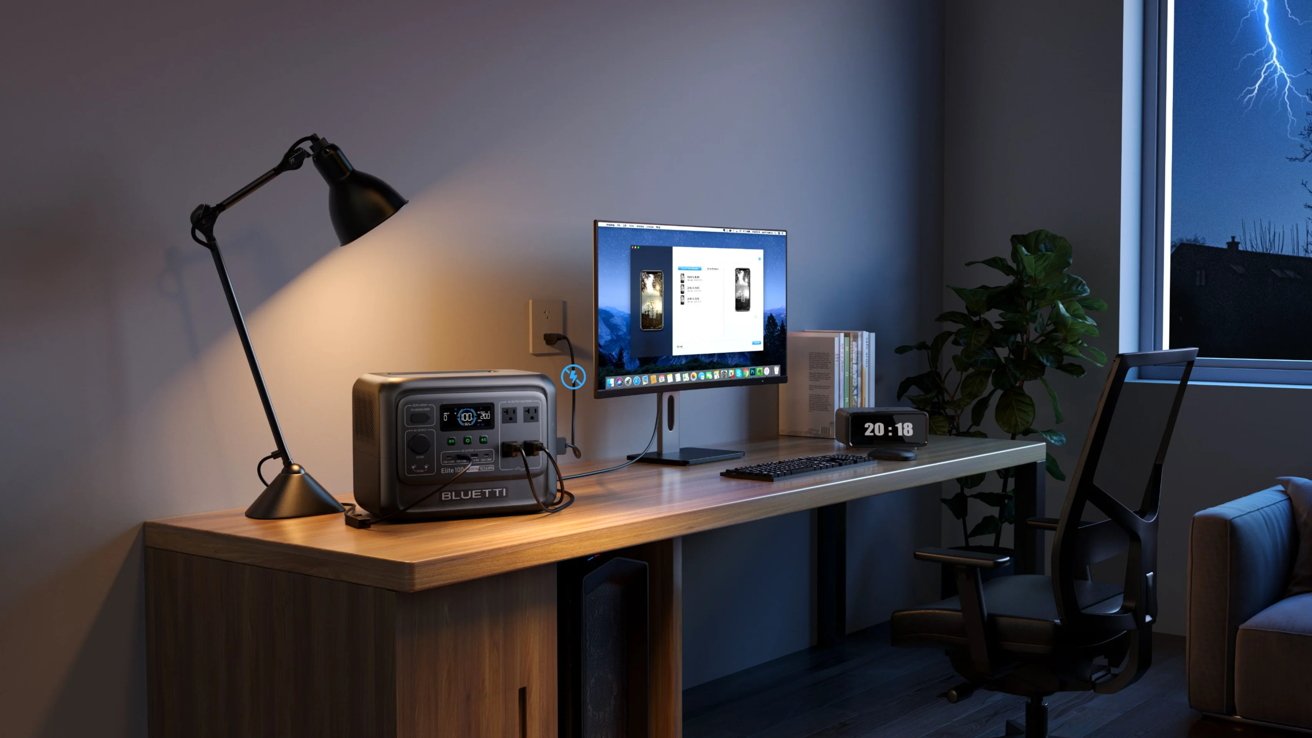 A modern desk setup with a computer, keyboard, desk lamp, digital clock, books, and a potted plant. A window shows lightning outside.