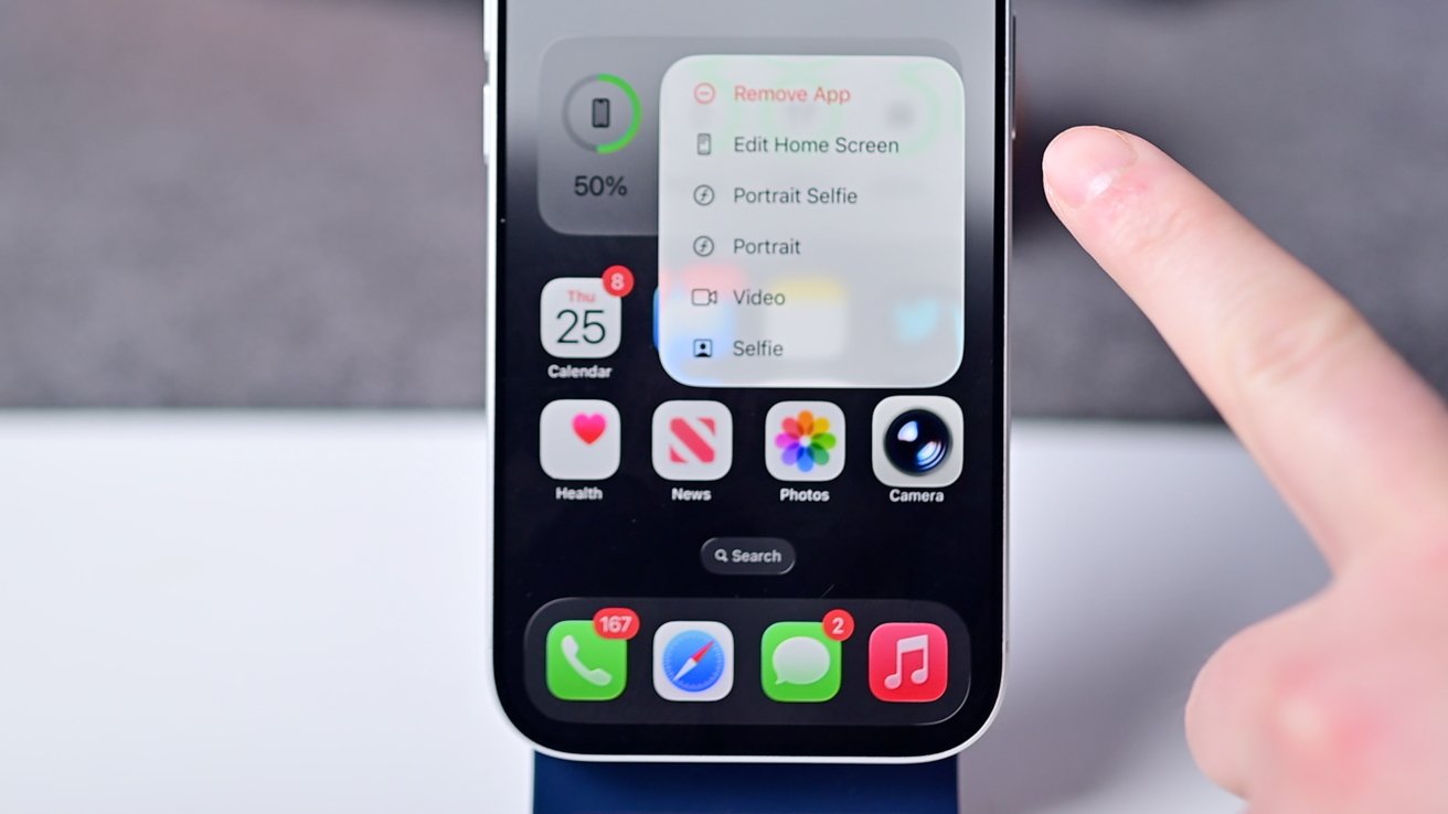 A smartphone screen shows apps, a widget displaying battery at 50%, and a finger accessing options like remove app and camera modes.