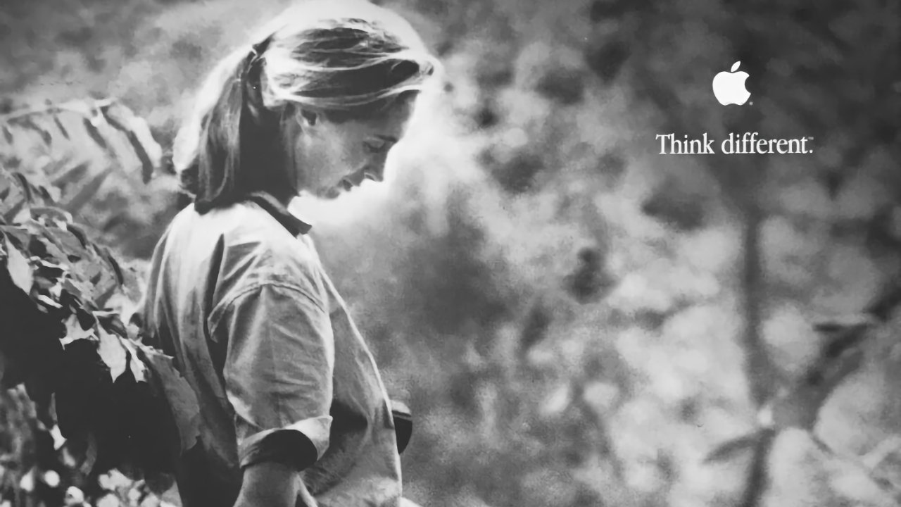 A black-and-white photo of a woman looking down, surrounded by foliage, with Apple logo and 'Think different' text.