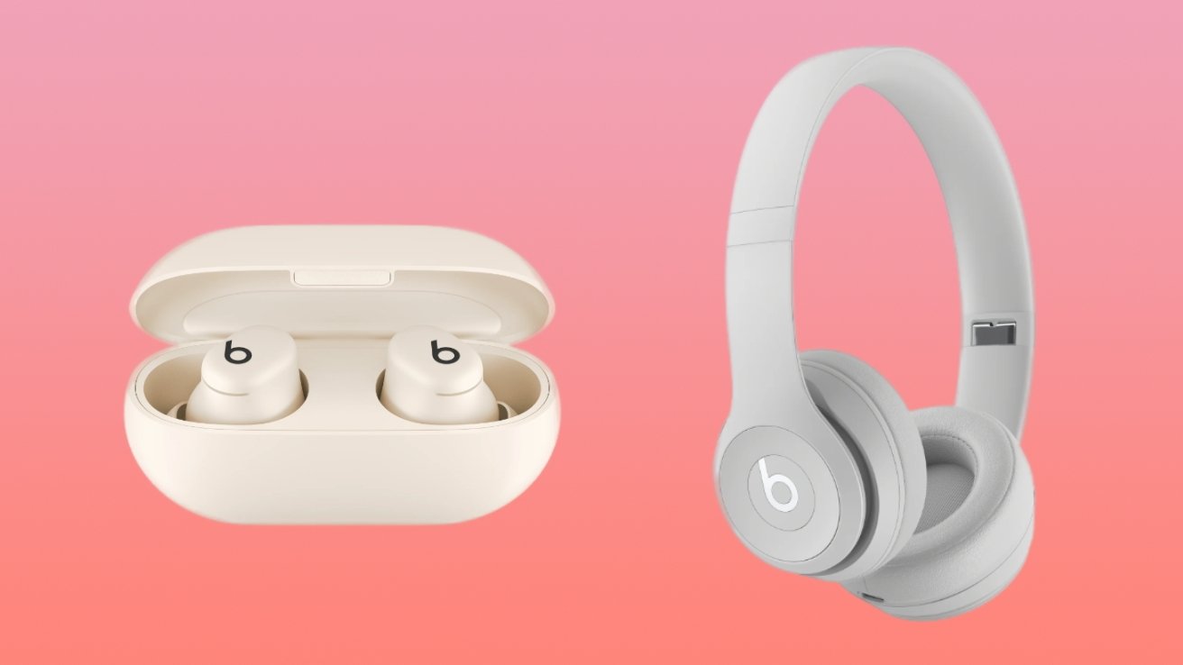 Cream earbuds in an open case and grey over-ear headphones on a pink gradient background.