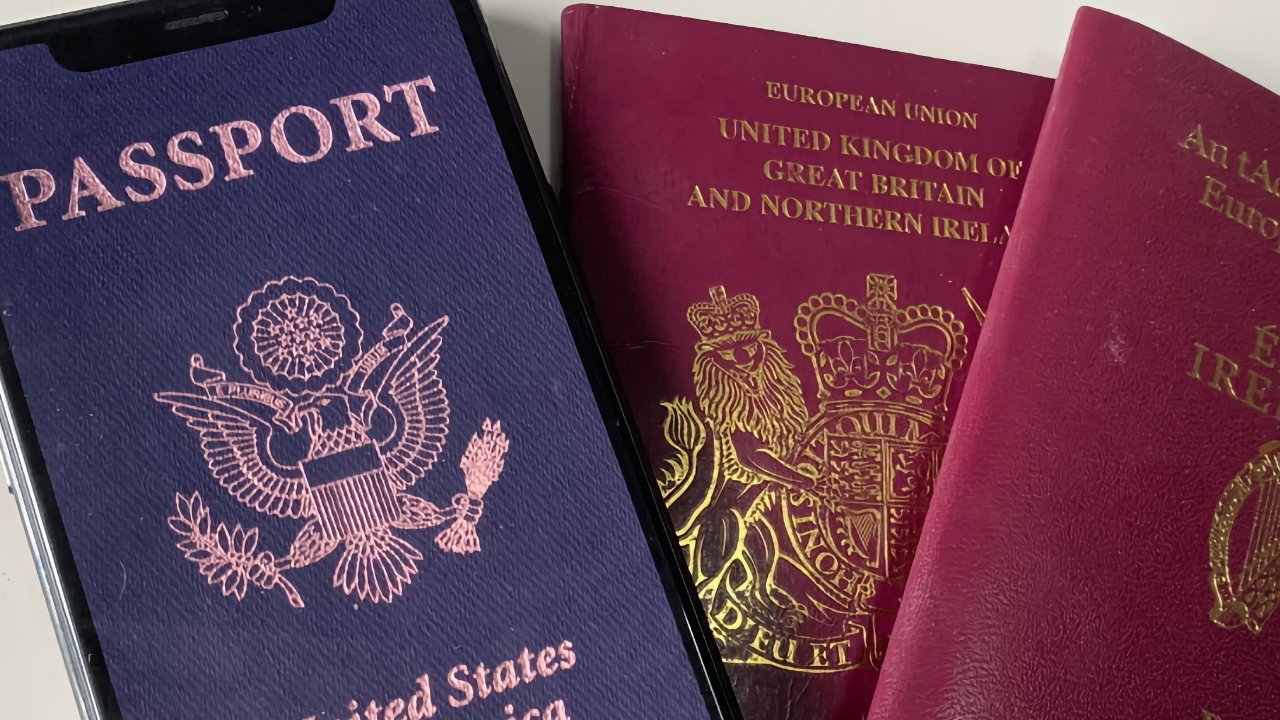 Three passports displayed: a blue US passport, a burgundy UK passport, and a red Irish passport, all showing their respective emblems and partial text.
