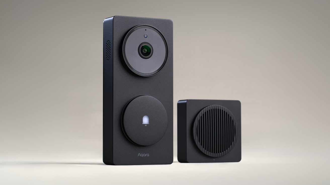 Black video doorbell and chime set against a neutral background, featuring a camera lens, circular button with bell icon, and speaker grill.