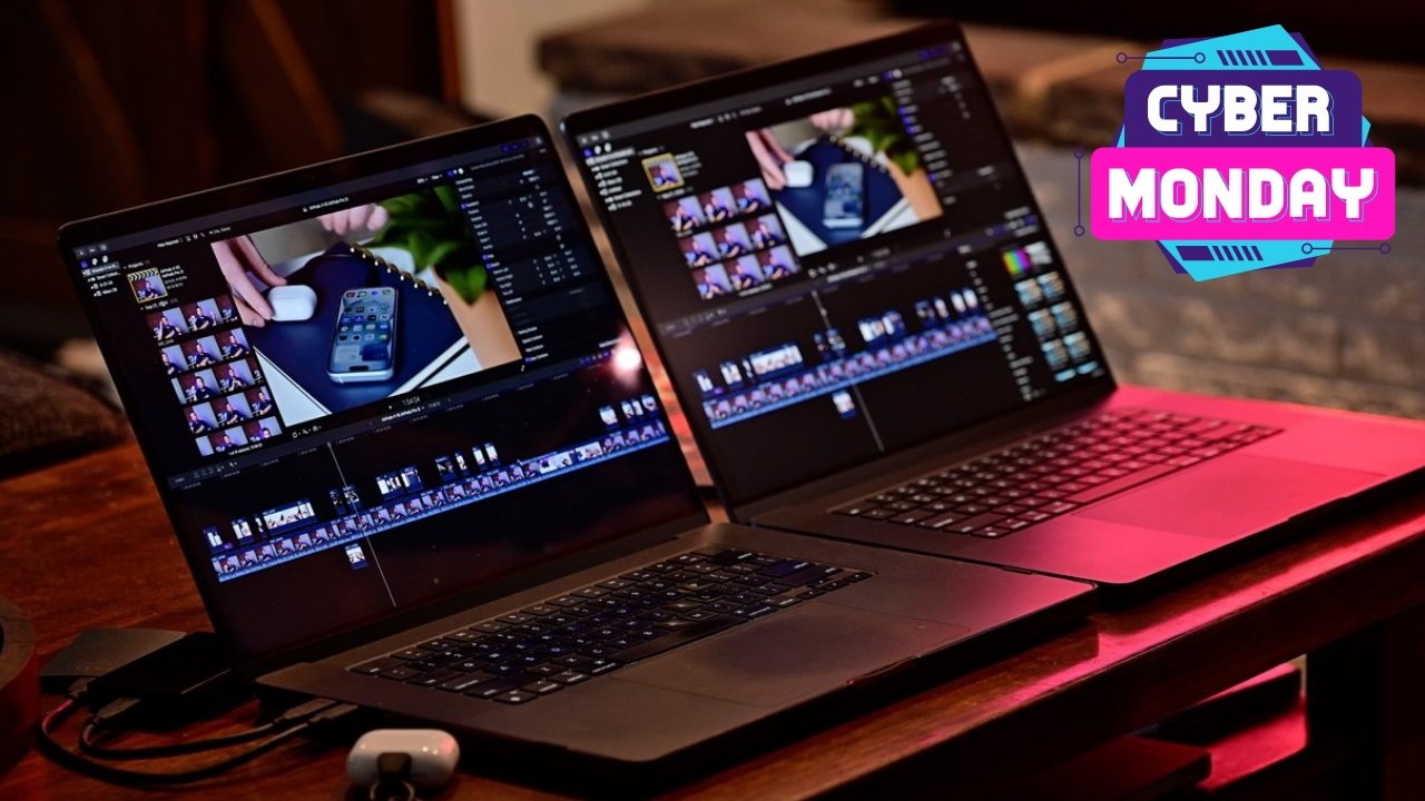 Two MacBook Pro laptops displaying video editing software on a wooden table with a Cyber Monday graphic in the top right corner.