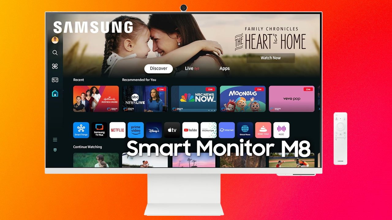 Samsung Smart Monitor M8 displaying streaming apps and family photo; white remote beside monitor on gradient orange-red background.