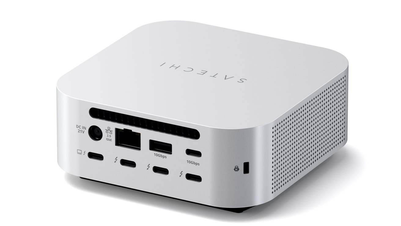 White rectangular electronic device with multiple ports and perforated sides. The brand name is printed on the top.