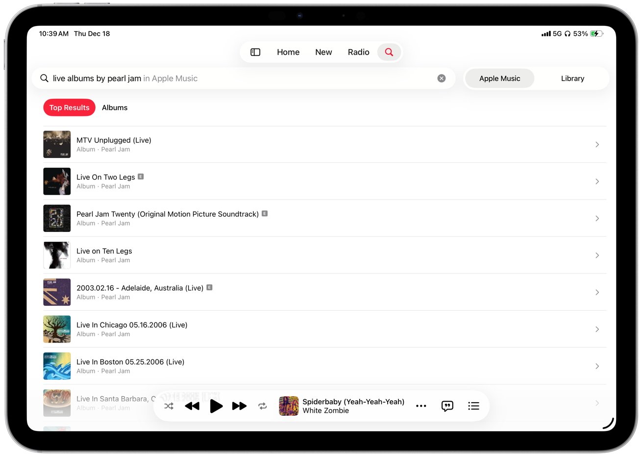 A tablet screen showing search results for Pearl Jam's live albums on Apple Music, including MTV Unplugged and Live On Two Legs. Music controls are visible at the bottom.