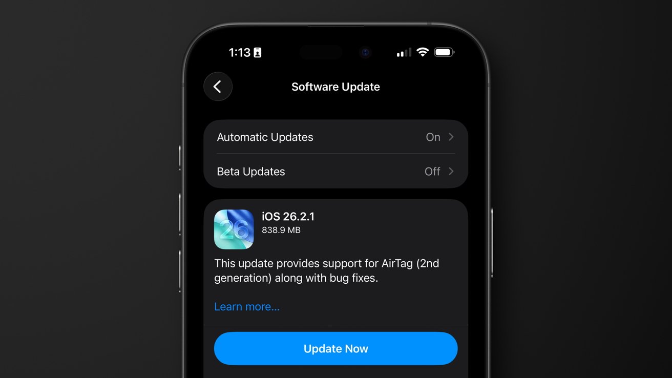 iPhone screen showing Software Update settings for iOS 26.2.1, 838.9 MB, mentioning support for AirTag second generation and bug fixes, with a prominent blue Update Now button