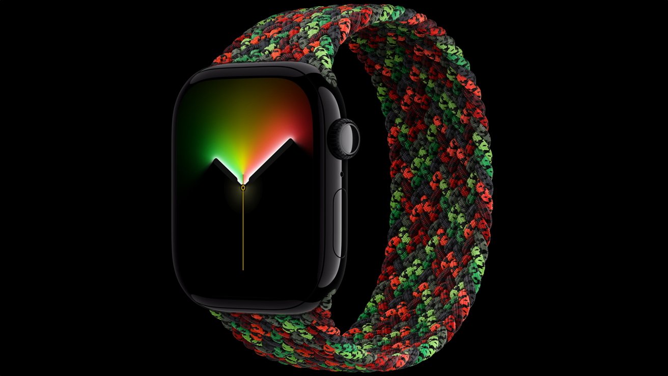 Black smartwatch with rounded screen showing glowing red, yellow, and green gradient watch face, attached to a thick woven band in red, green, and dark gray colors on a black background