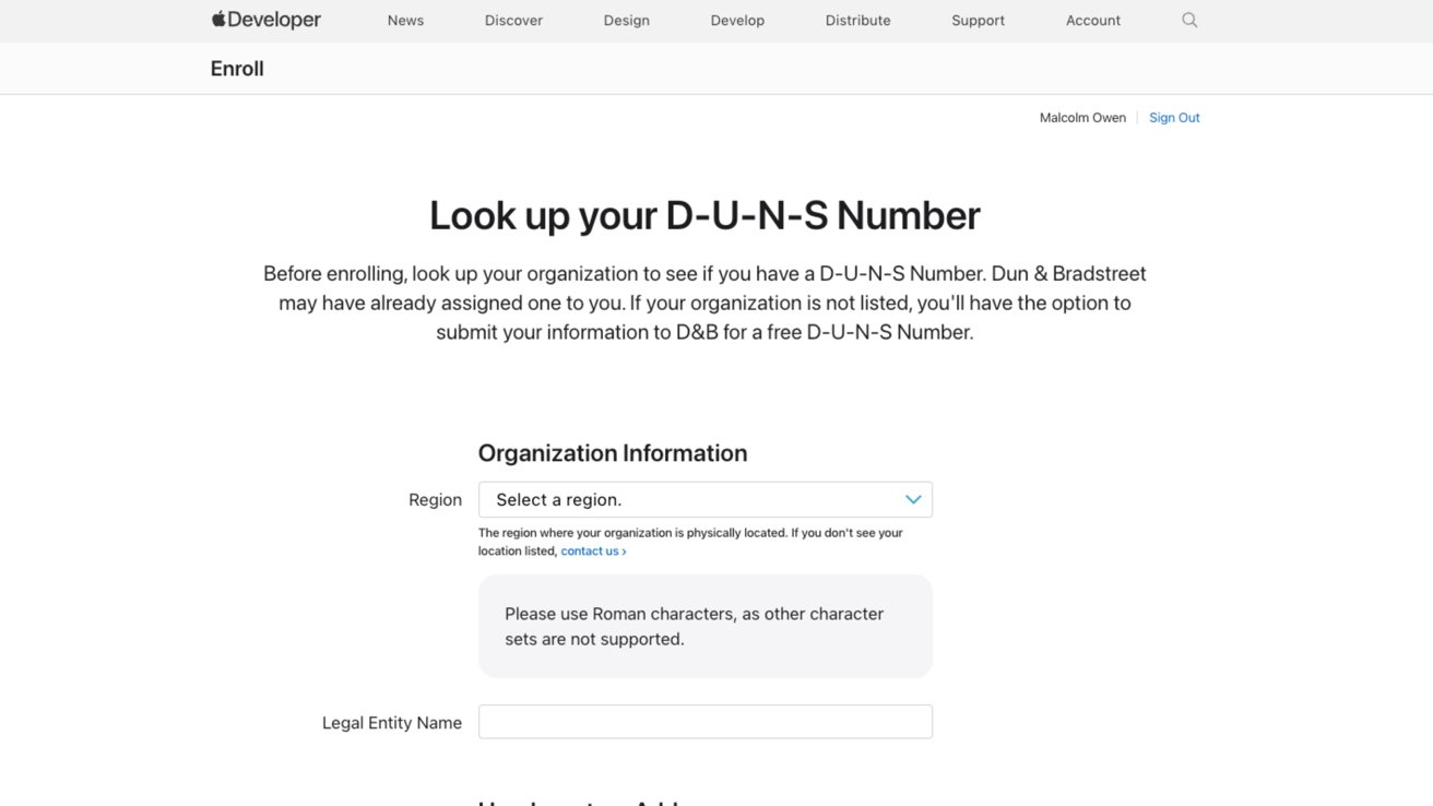 Apple Developer website form to look up a DUNS number, showing an organization information field including a drop-down list of region, legal entity name, and instructions to use Roman characters only