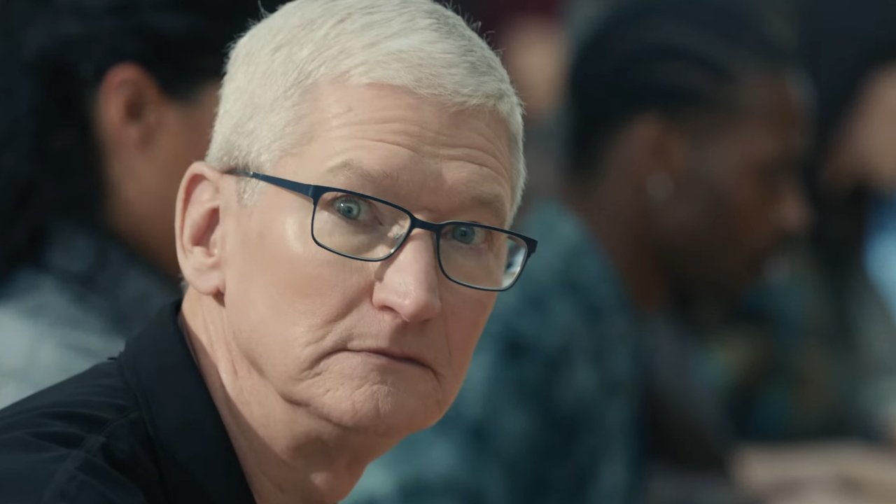Tim Cook, CEO of Apple, with a surprised look on his face