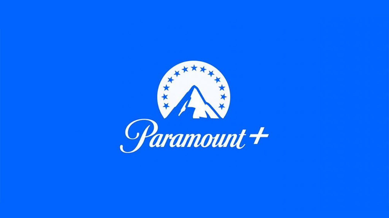 Paramount Plus logo on bright blue background, featuring a white mountain inside a circle of stars above the cursive word Paramount followed by a plus symbol.