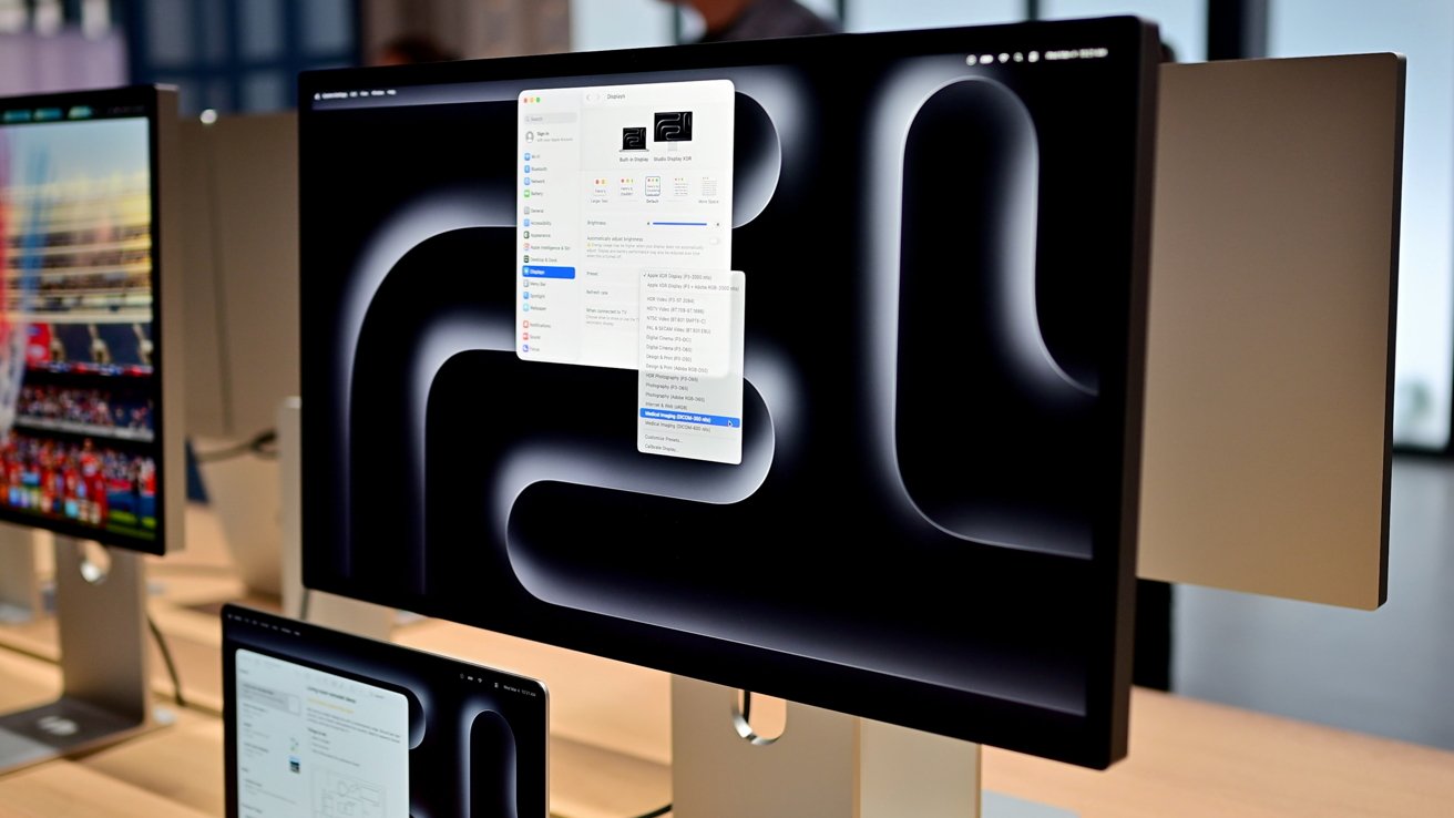 A menu open on the Studio Display XDR showing DICOM as an option for display configuration
