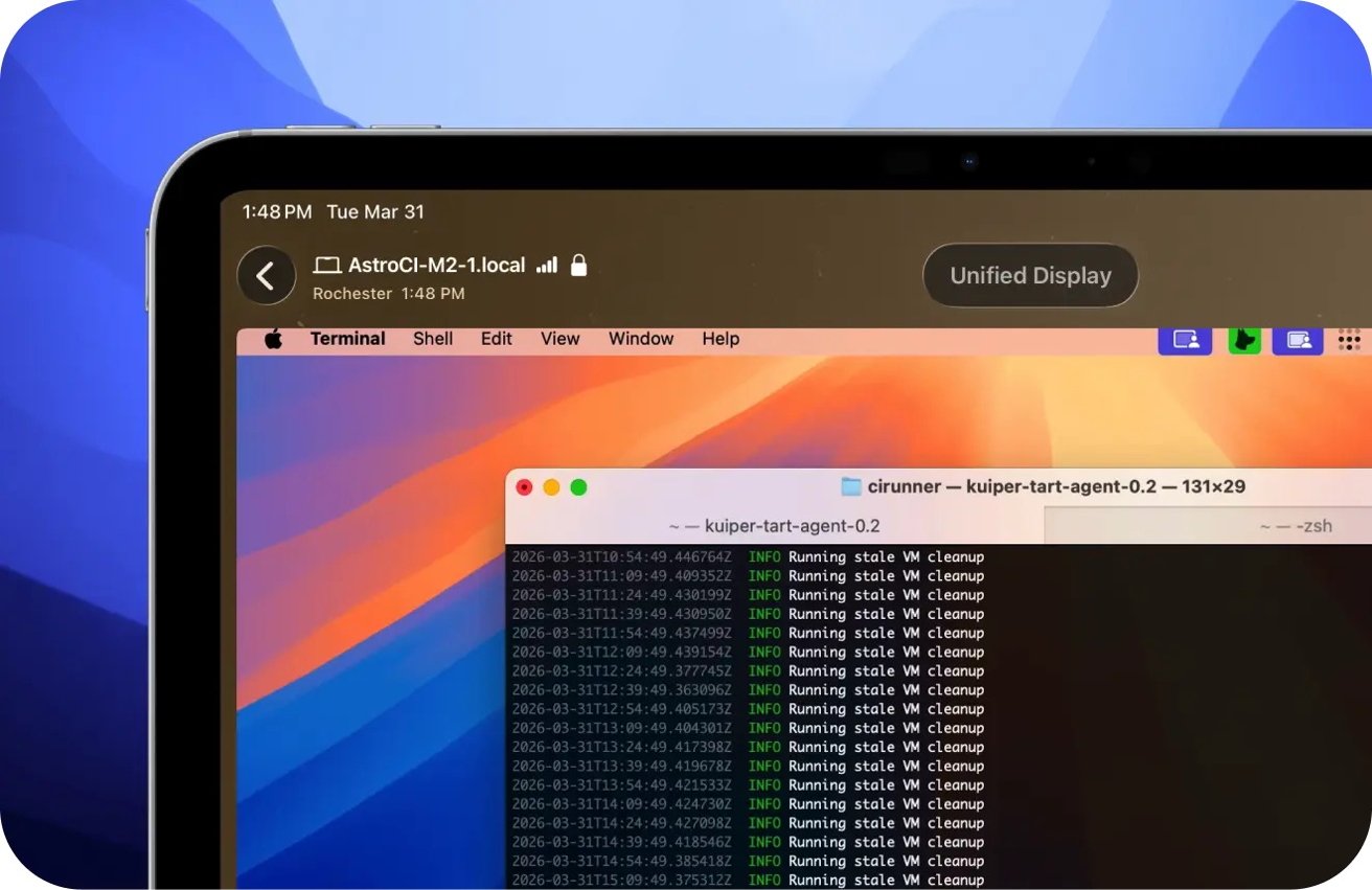Close-up of a MacBook screen showing macOS desktop with colorful gradient wallpaper and a terminal window running command-line scripts, plus menu bar displaying time, location, and Unified Display button