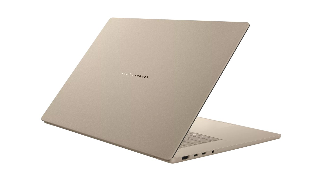 Slim gold ASUS Zenbook laptop partially open, viewed from behind, showing minimalist lid design, right-side ports, and light-colored keyboard against a plain white background
