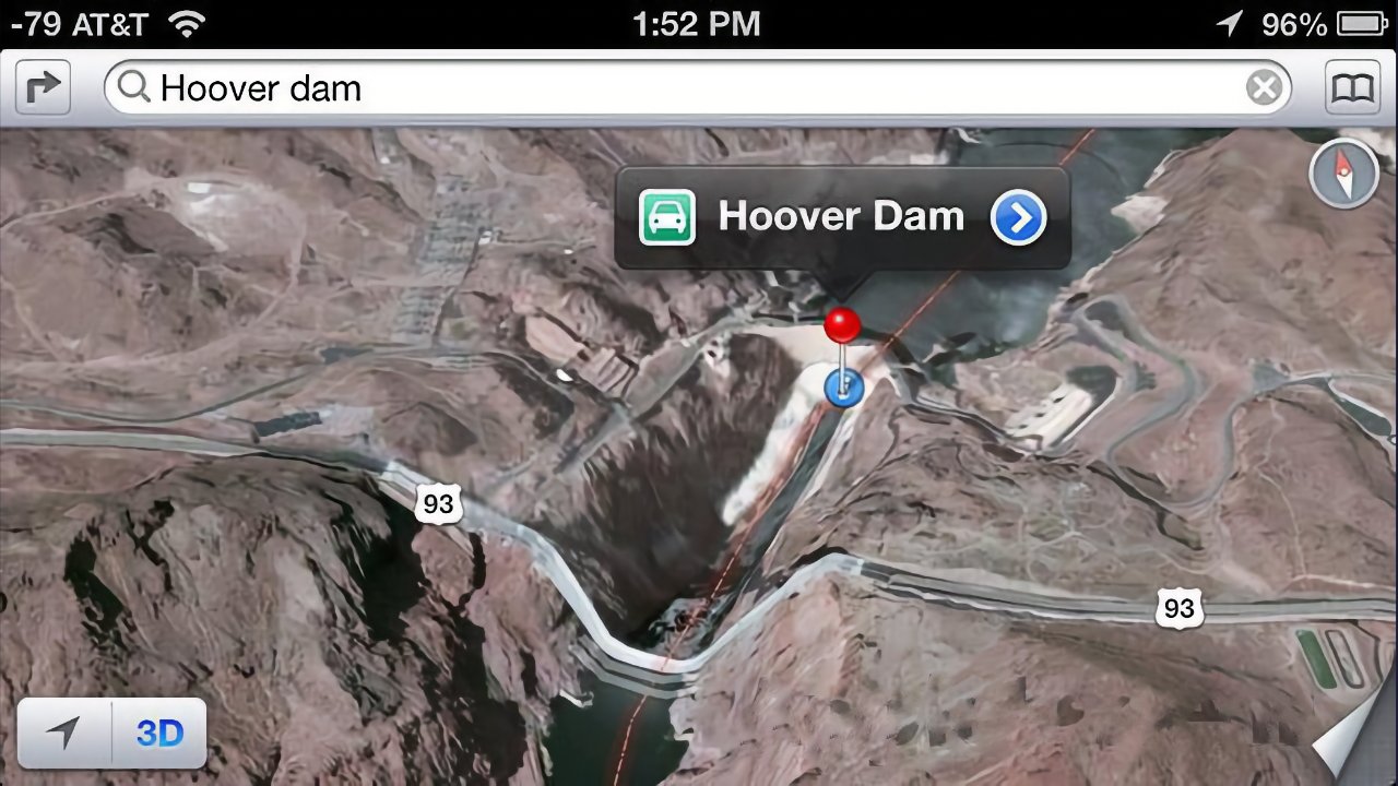 Satellite map on a smartphone showing Hoover Dam area, desert terrain, Highway 93 label, a red location pin, navigation options, and 3D view button at the bottom left