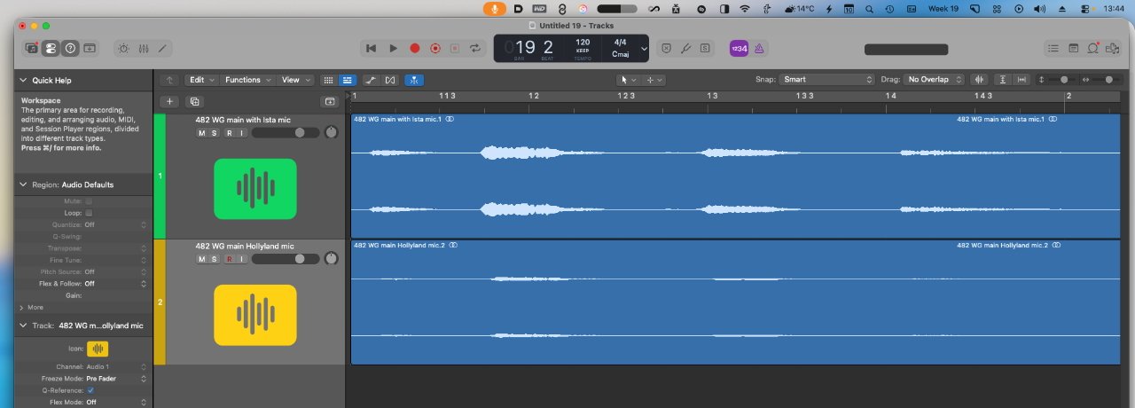 Audio editing software window showing two horizontal tracks with blue waveforms, green and yellow track icons on the left, transport controls and timeline across the top on a Mac screen