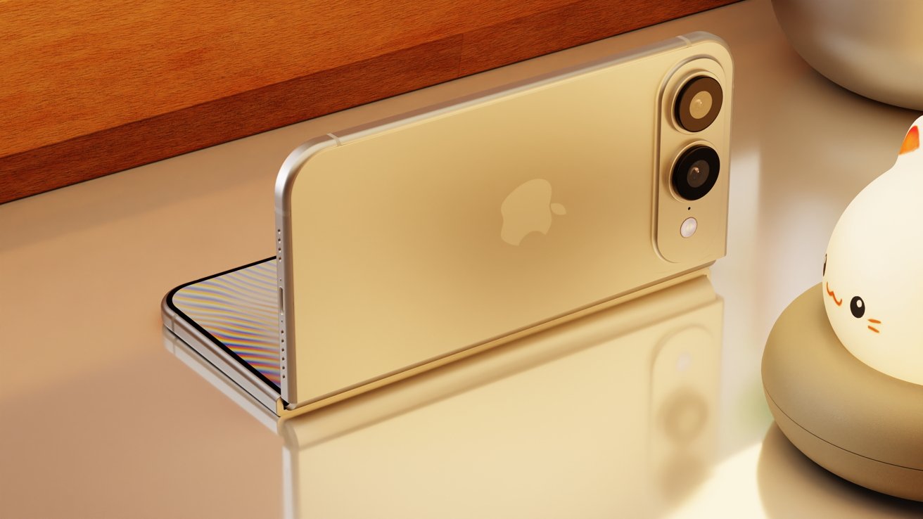 Gold foldable iPhone render standing on a reflective surface beside a small glowing cat-shaped lamp, with warm lighting and wooden background creating a cozy, modern desk scene
